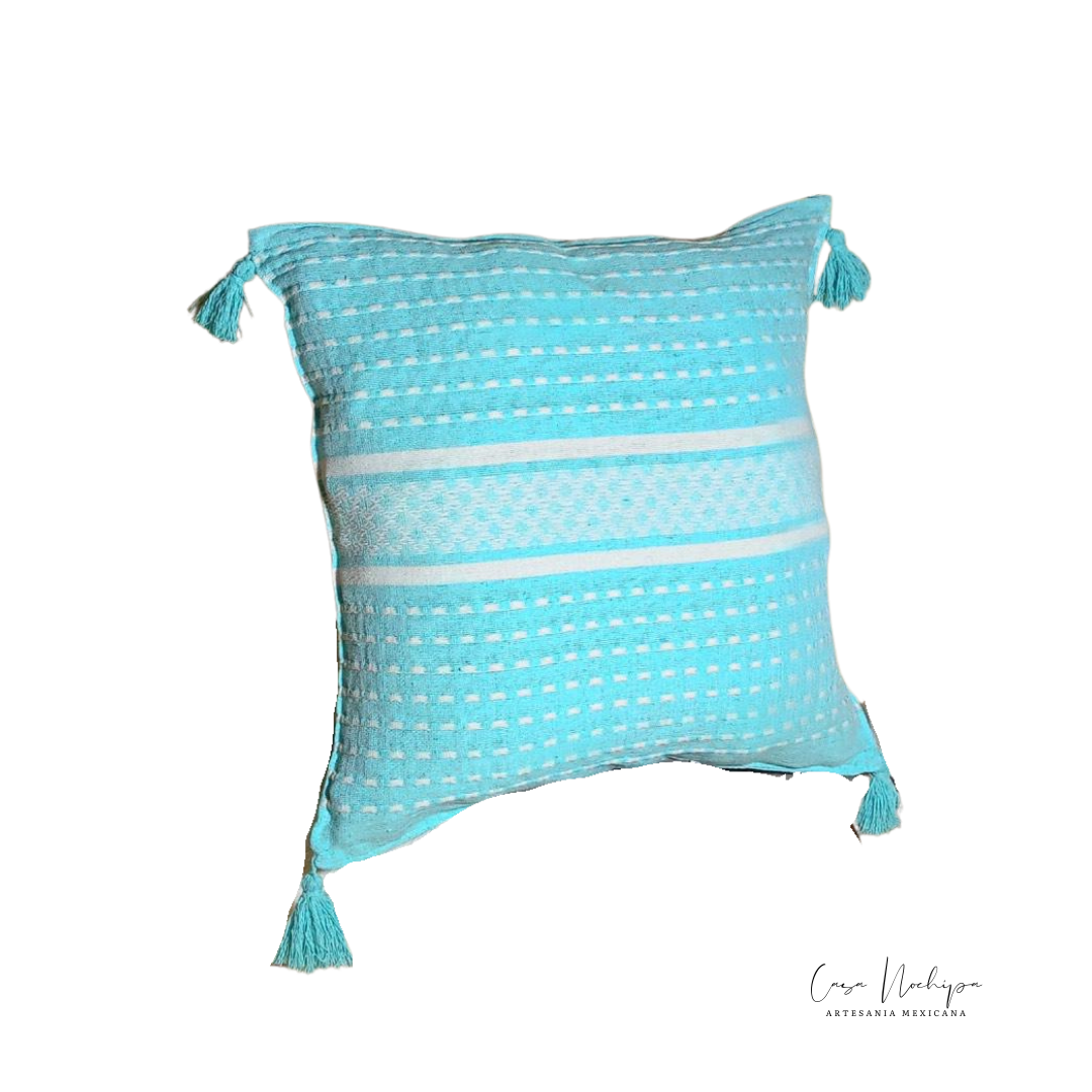 Cojín artesanal de 45x45 cm tejido en telar de pedal con algodón orgánico, elaborado en Oaxaca, ideal para decoración ecológica.