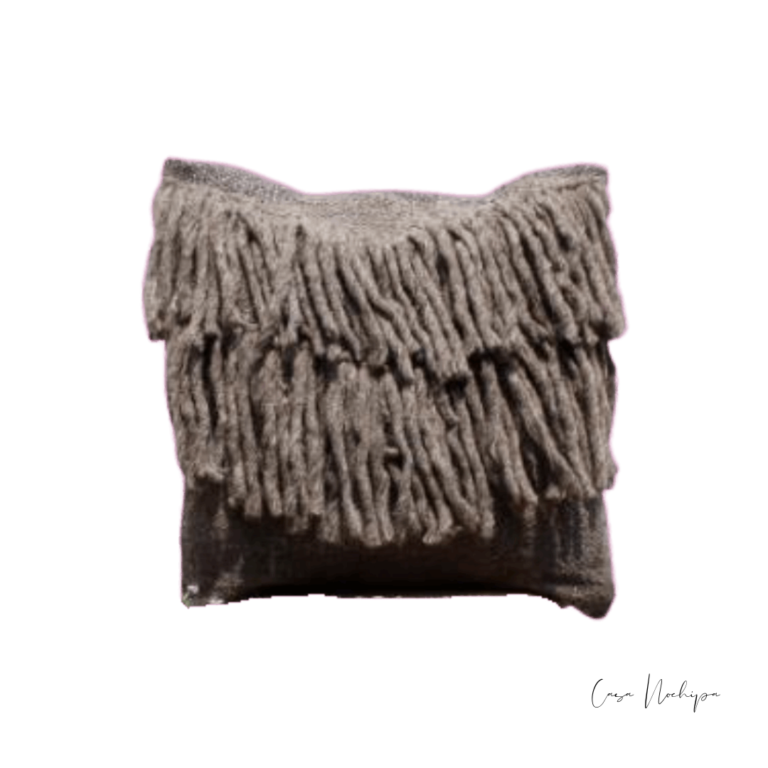 Cojín decorativo hecho a mano, con patrones tradicionales de Oaxaca.